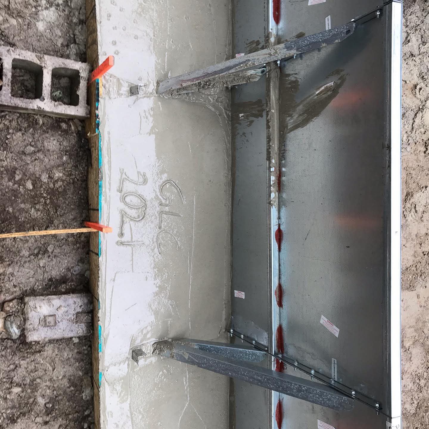 Foundation drain tile installation Barrie Ontario weeping tile sub drain perforated pipe gravel bedding