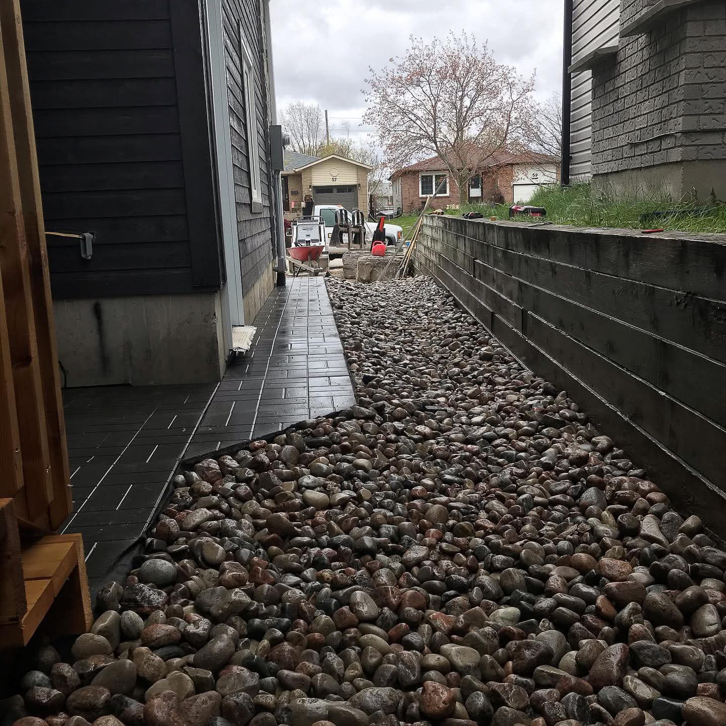 Clogged weeping tile replacement Barrie Ontario foundation drain perforated pipe