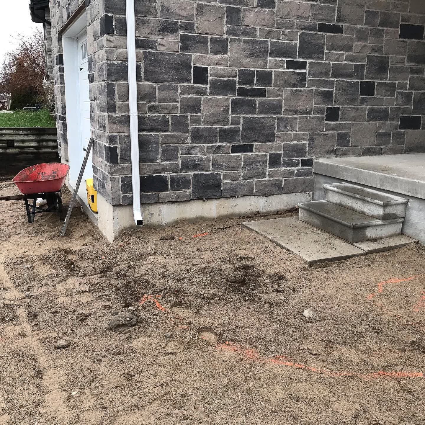 Natural stone steps front entrance Simcoe County hardscaping
