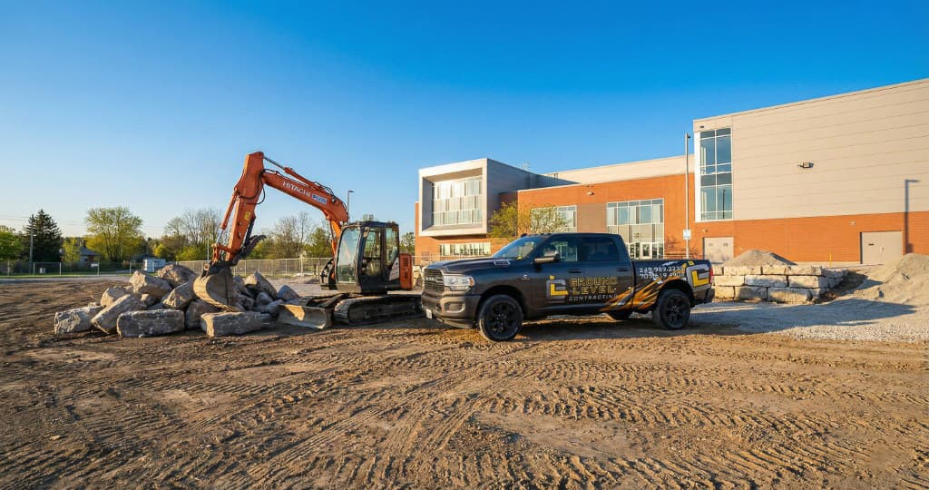 Machine-controlled trench and grade on a Simcoe County civil project